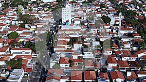 View of the different red roofs of houses.
