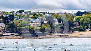 View of Dinard city with coastline full of boats. Brittany, Fran