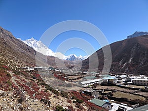 View of Dingboche village which lies in the Imja Khola river valley and Mt Lhotse, Sagarmatha National Park, Nepal