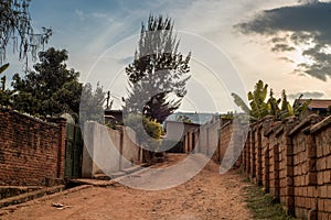 View of a dirt road between houses in Nyamirambo, an outlying su