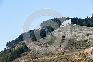 View into the distance of the Ermita de la Virgen de la Cabeza, Patrona de Cazorla, Jaen Andalucia, Spain photo