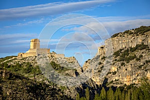 View from the distance of the medieval Taibilla castle in Nerpio, Albacete photo