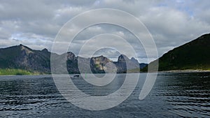 View from the dock to the beautiful fjord boat sails into the