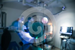 View of doctors operating patient in surgery room