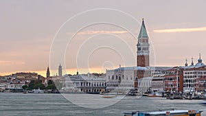 View of the Doge's Palace and the Campanile of St. Mark's Cathedral at sunset timelapse. Venice, Italy