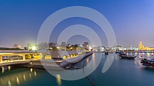 View of the Doha city in front of the Museum of Islamic Art day to night timelapse in the Qatari capital, Doha.