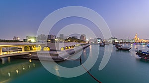 View of the Doha city in front of the Museum of Islamic Art day to night timelapse in the Qatari capital, Doha.