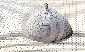 View of a dome figure on the brick flooring