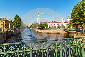 View on the dome of the Saint Nicholas naval Cathedral, with the crossing of Griboyedov canal and Kryukov canal