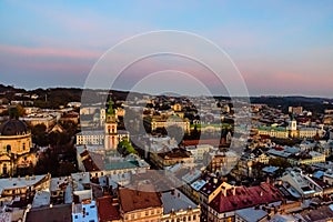 View on Dominican cathedral, Dormition church and historic center of the Lviv at sunset. View on Lvov cityscape from the town hall