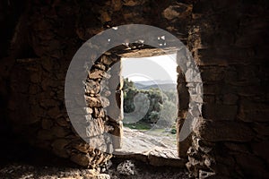 View through door of Troglodyte house at Ostriconi in Corsica