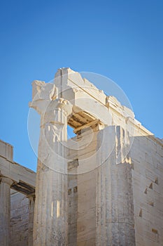 View of the Doric column in the Acropolis against the blue sky in Athens