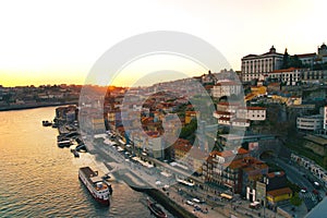 View of Douro river at Porto, Portugal. Porto, Portugal old town ribeira aerial promenade view with colorful houses, Douro river