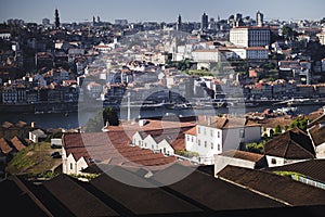 View of the Douro River and Porto`s Ribeiro from the rooftops of port wine cellars in Vila Nova de Gaia, Portugal.