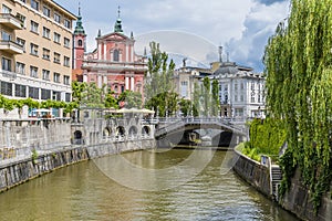 A view of down the Ljubljanica River towards the Triple bridge and Preseren Square in Ljubljana