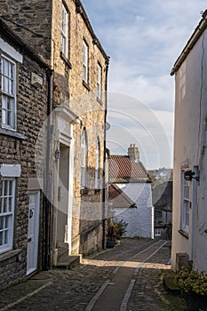 A view down a pretty cobbled side street in Richmond, North Yorkshire