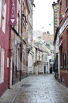 View down quaint cobbled Grape Lane, Whitby