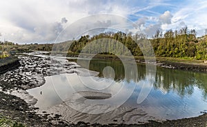 A view down the River Cleddau at low tide at Pembroke, Wales