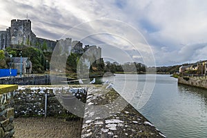 A view down the River Cleddau past the castle at Pembroke, Wales
