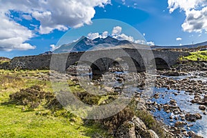A view down the River Sligachan towards the old bridge at Sligachan on the Isle of Skye, Scotland