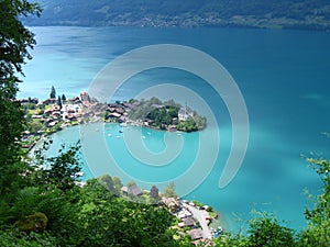 View down on to the picturesque Swiss Fishing village of Iseltwald on Brienzersee