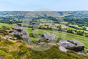 A view down towards the Bamford past the rocky outcrops of Bamford Edge, UK