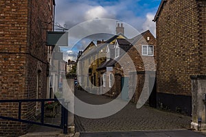 A view down a traditional quaint street in Melton Mowbray, Leicestershire, UK photo