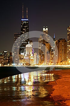 View of downtown Chicago at duskView of downtown Chicago and Lake Michigan after sunset.