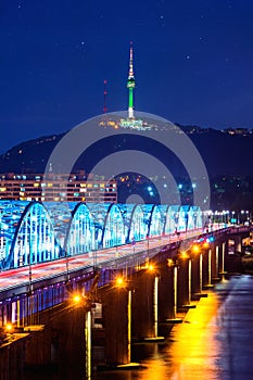 View of downtown cityscape at Dongjak Bridge and Seoul tower over Han river in Seoul, Korea.