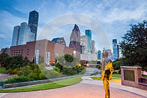 View of downtown Houston at twilight with skyscraper