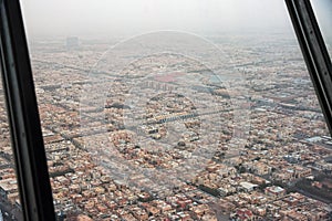 The view on downtown from Sky bridge in Kingdom Centre, Burj Al-Mamlaka in Riyadh, Saudi Arabia photo