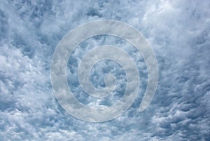 View of dramatic cloudy dark blue sky. Overcast Texture background of solid cloud