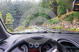 View from driver. Driving by car snowing road to Pico Ruivo, Madeira mountain photo
