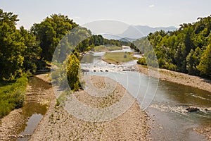 A view of the Drome River in the South East of France at the height of summer with shingle beaches when the river is at a low