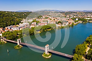 View from drone of Givors summer cityscape on Rhone river, France