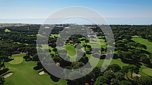 View from drone of luxury resort with golf courses