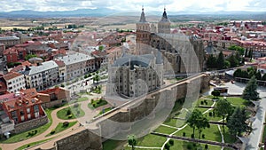 View from drone of residential area of Spanish city of Astorga overlooking medieval Gothic Cathedral and Episcopal