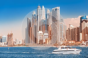 view of Dubai skyscrapers - hotels and apartment buildings. Real estate in Persian Gulf concept. Elite resort in United