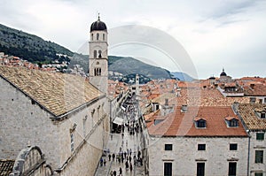 View of Dubrovnik city center, old tower and crowd