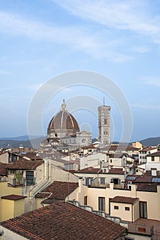 View of the Duomo and Giotto`s bell tower from the rooftops of Florence