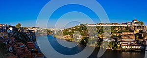 View of the Duoro River, Porto City and Vila Nova de Gaia in a beautiful early spring day in Portugal