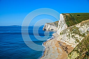 View of Durdle Door, a natural limestone arch on the Jurassic Coast near Lulworth in Dorset, England, UK