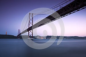 View at dusk of the 25th of April Bridge in Lisbon, Portugal