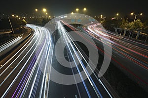 View dusk urban rainbow light night traffic on the highway