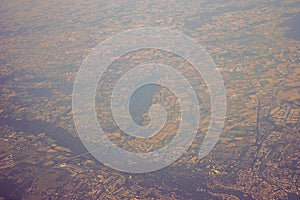 View of the earth landmass seen from an airplane window from Venice to Schiphol