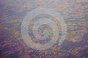 View of the earth landmass seen from an airplane window from Venice to Schiphol