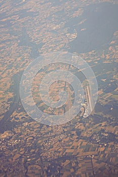 View of the earth landmass seen from an airplane window from Venice to Schiphol