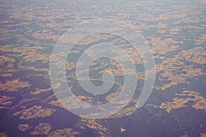 View of the earth landmass seen from an airplane window from Venice to Schiphol