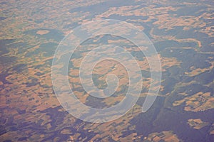 View of the earth landmass seen from an airplane window from Venice to Schiphol