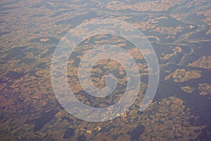 View of the earth landmass seen from an airplane window from Venice to Schiphol